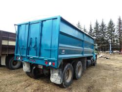 Picture: 1979 IHC S-1954 T/A GRAIN TRUCK W/ 18’ RENN FORTRESS II BOX & HOIST, SILAGE GATE, TARP, SILAGE EXTENSIONS, A/T  11R22.5 REAR RUBBER 67,358 KM SHOWING